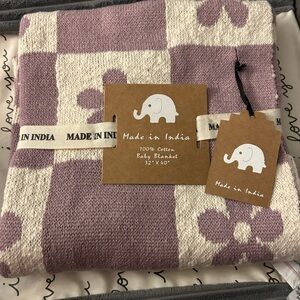 NWT- Purple and white floral blanket. New. Perfect shower or new baby gift